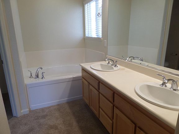 Master bathroom which has a separate toilet and shower room