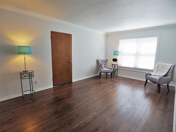 Freshly restored wood flooring, new paint, new window treatments, crown molding, new trim and more.