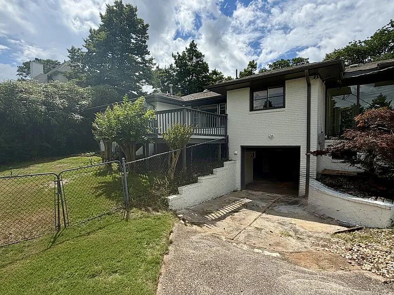 Large basement under main floor, with garage door access