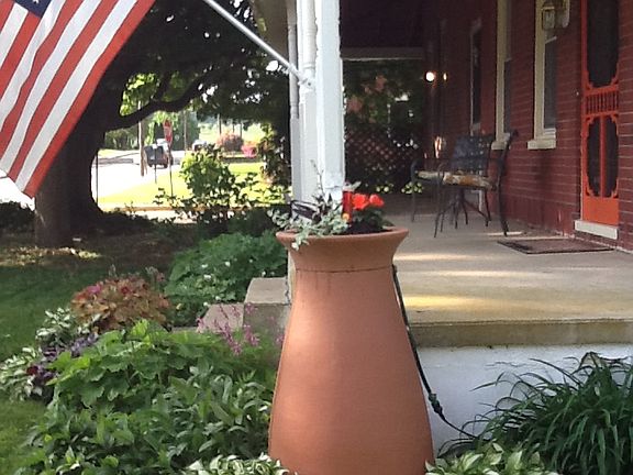 Water barrel at front porch