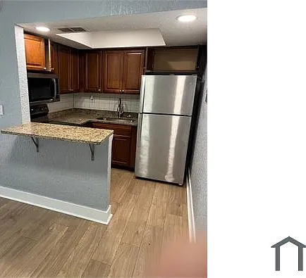 5825 NW 22nd Ct — Photo 1