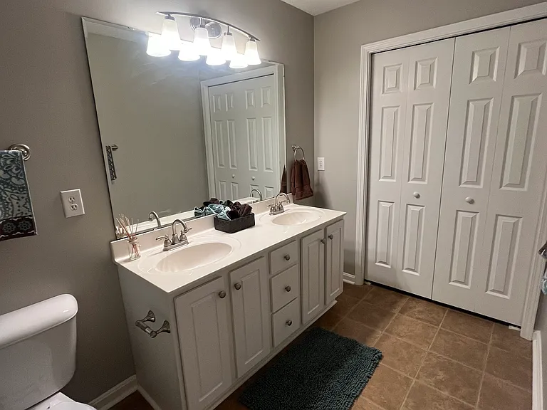 primary bath with double vanities