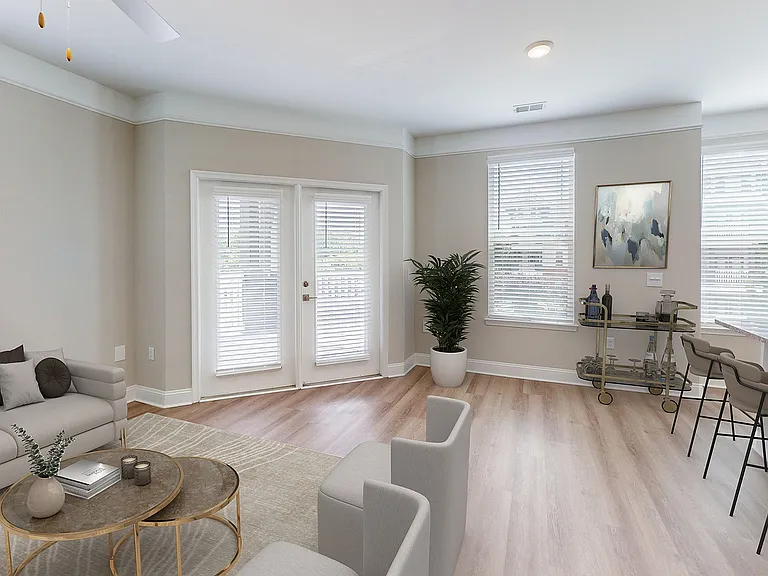 Newly Renovated Living Room with Hardwood-Style Flooring
