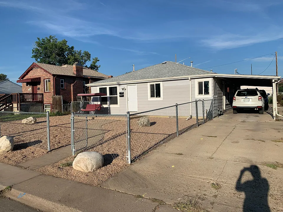 Carport and driveway parking. Private yard too!