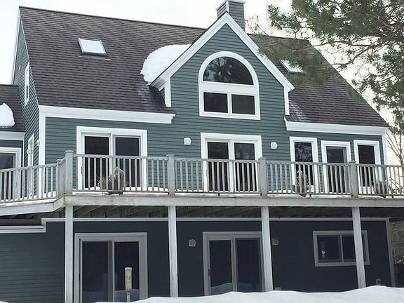 Back: North Elevation
						:
						lots of northern light throughout the house