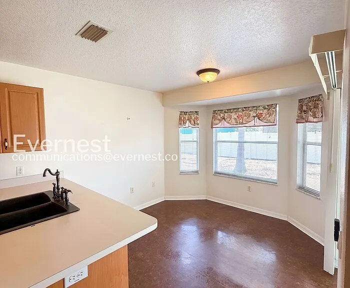 6930 Frascati Loop — Photo 8