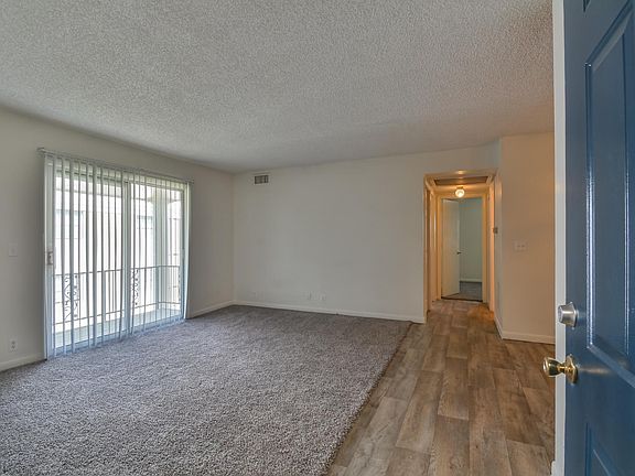 2 Bedroom Floor plan Living room with carpet and woodgrain f