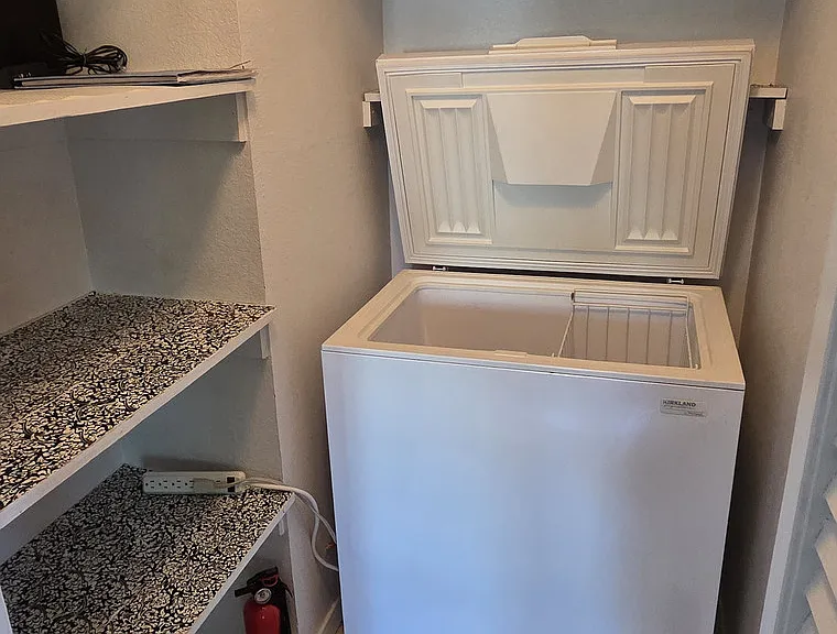Pantry with box freezer.