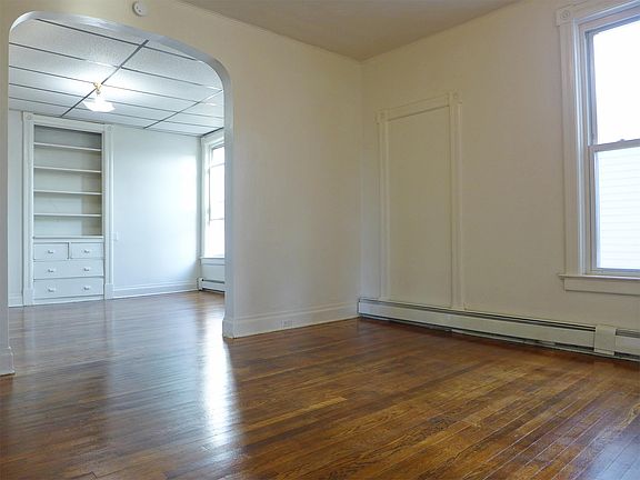 Dining room (back) has built-in shelves & drawers