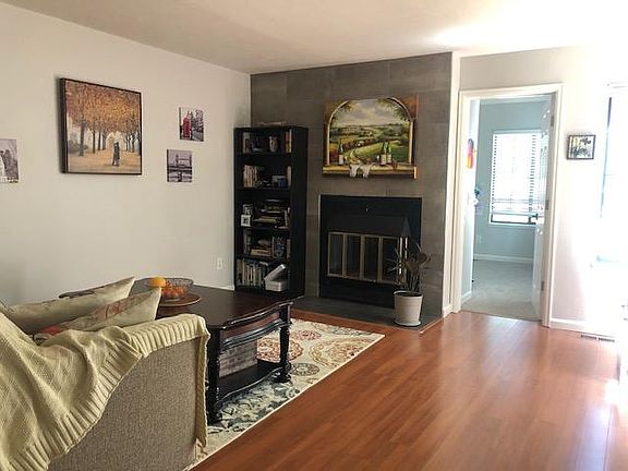 Living Room with wood burning fireplace.