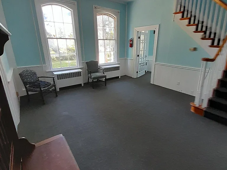 large living room first floor, tall ceilings, big windows