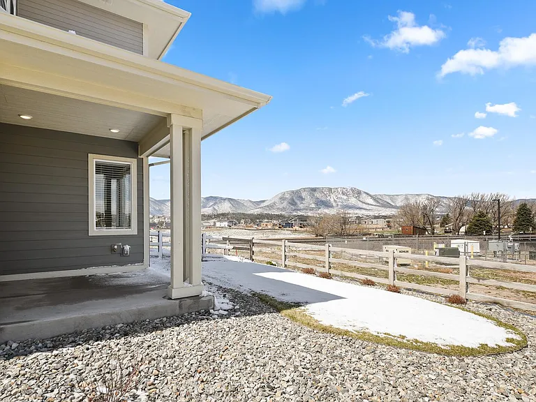 Fenced yard, mountain views, covered concrete patio