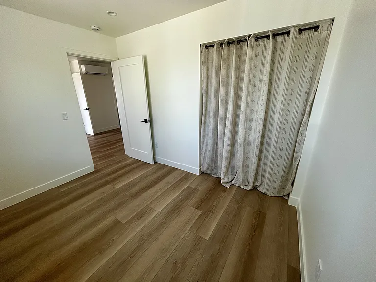 Both bedrooms are the same size with ample closet space.
