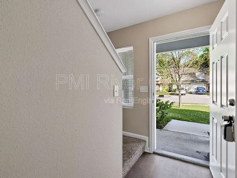 7608 Rain Forest Dr N — Photo 9