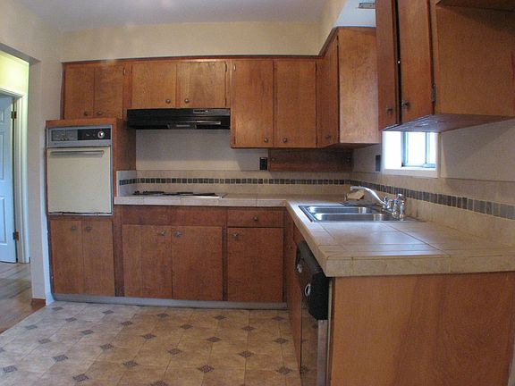 Kitchen with Tile Countertops and Floors