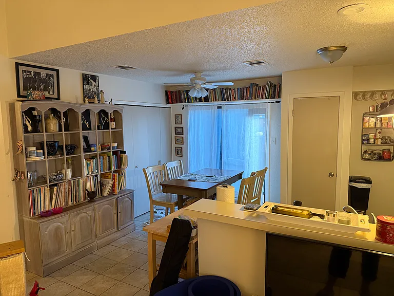 Looking into breakfast area and kitchen from living room.
