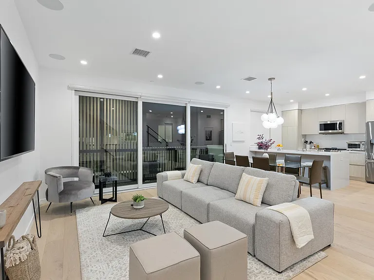 The Main level features an open plan living room and kitchen