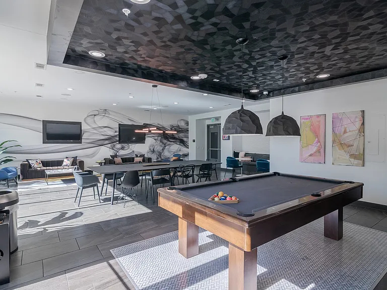Billiards Table in an Updated Resident Clubhouse at Abstract at Design District in Dallas TX, 75207