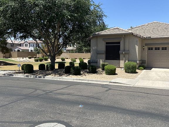 shade trees next to home helps reduce utilities and keeps rooms cool. Next to green belt.