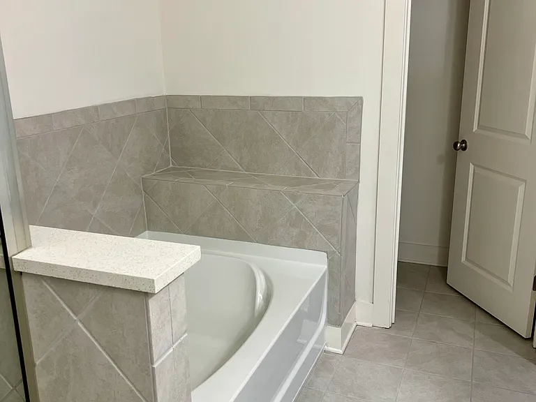 The toilet is given private access within the bathroom