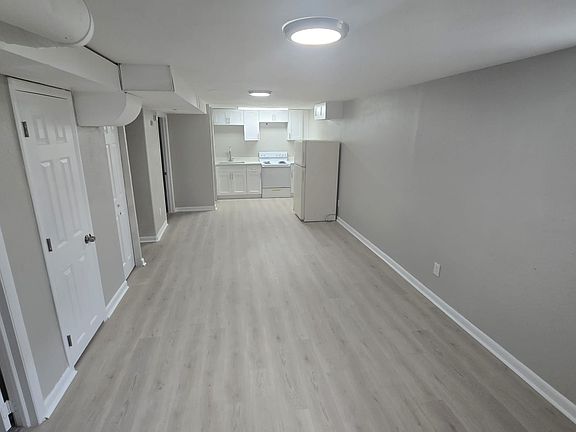 DOWNSTAIRS LIVING ROOM AND SMALL KITCHEN