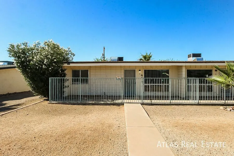Building Photo - 7015 E Wilshire Dr #4