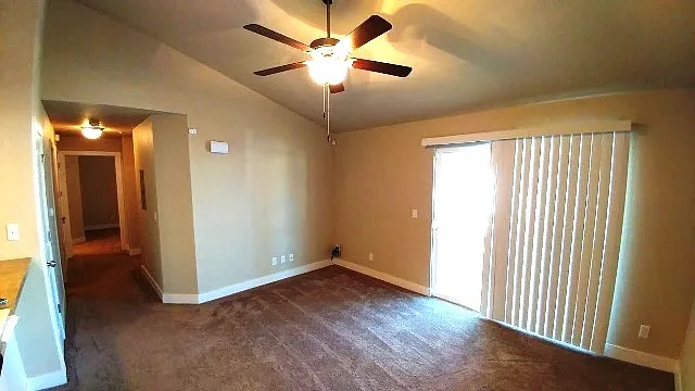 Living room, covered deck off the living room with a heated storage room