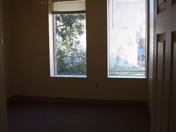 Bedroom with 2 large windows overlooking Schatzell Street from the 2nd floor.
