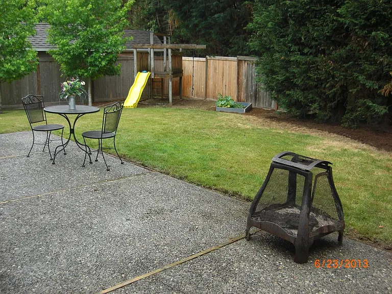 Backyard with patio and playset