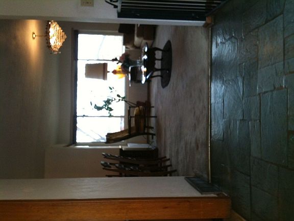 Beautiful stone entrance leading to large living room. 