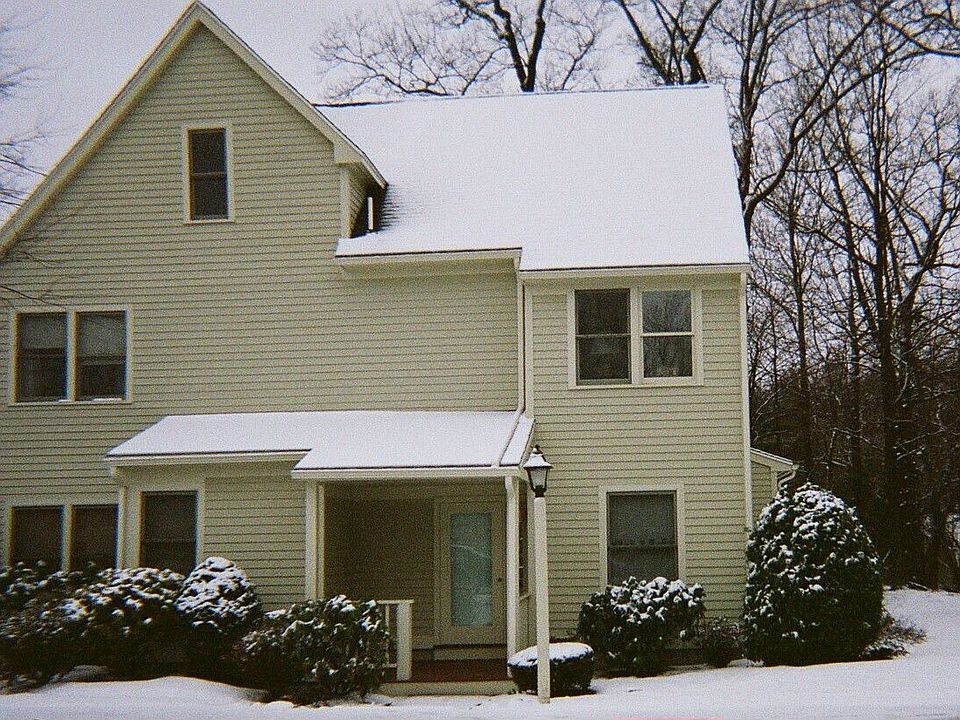 Front door glimpse of side yard