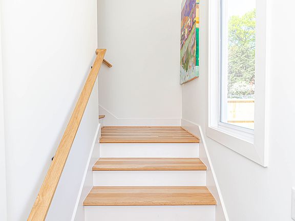 stairs from front entry to upstairs