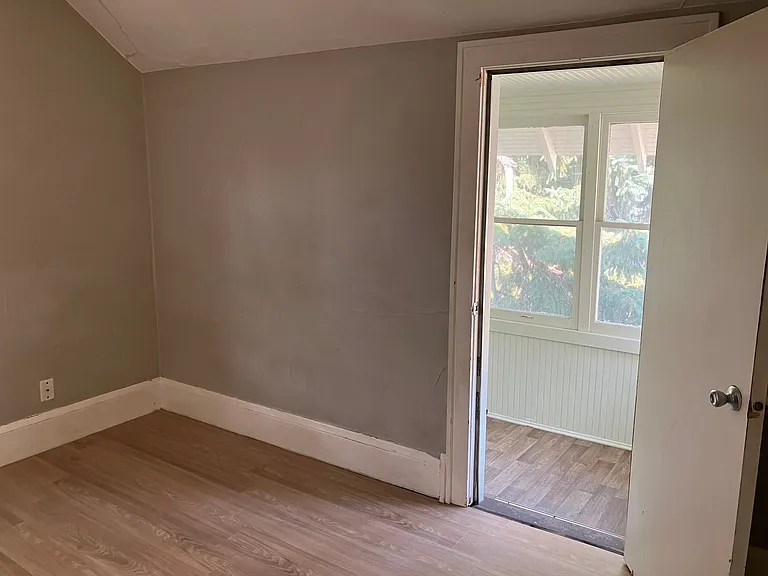 Large bedroom with attached porch
