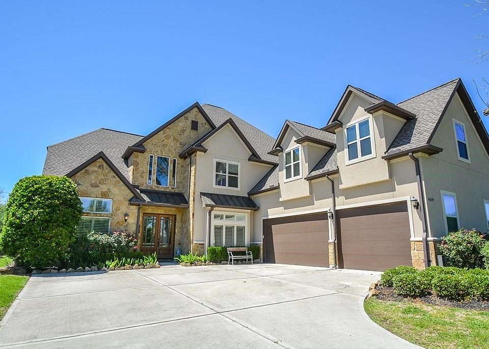 Located at 4619 Wentworth with views of the 8th Fairway of the prestigious Golf Club at Weston Lakes.