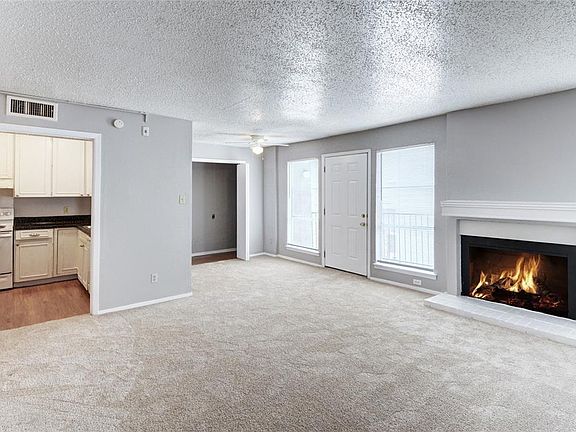 LIVING ROOM OPEN TO THE DINING ROOM