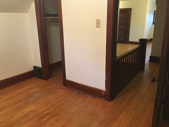 Hardwood floors and wide trim