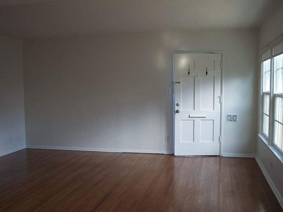 Living room with entrance into house