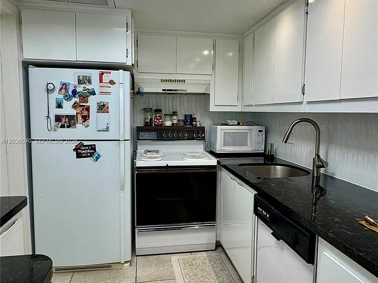 2940 NE 203rd St #C213 — Photo 1