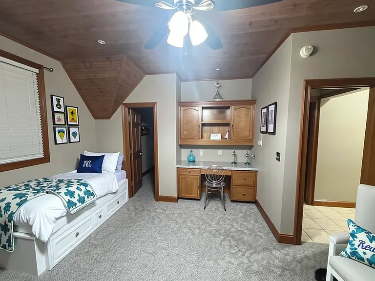 Apt 1C - 2nd Bedroom and study with custom shelves, walk-in closet and full-size bathroom.