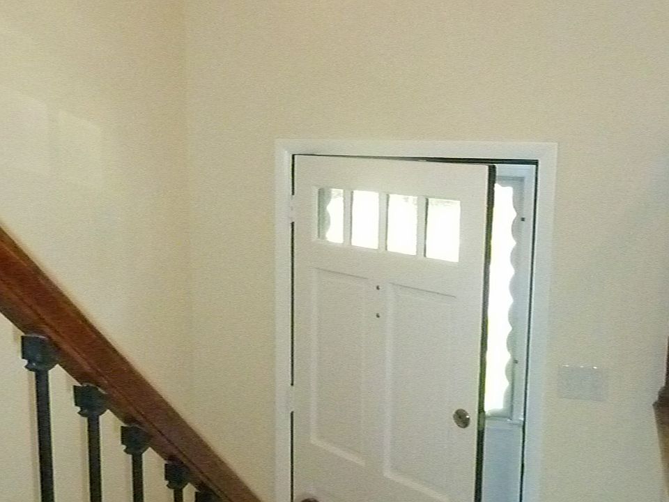 The ceramic tile entry foyer