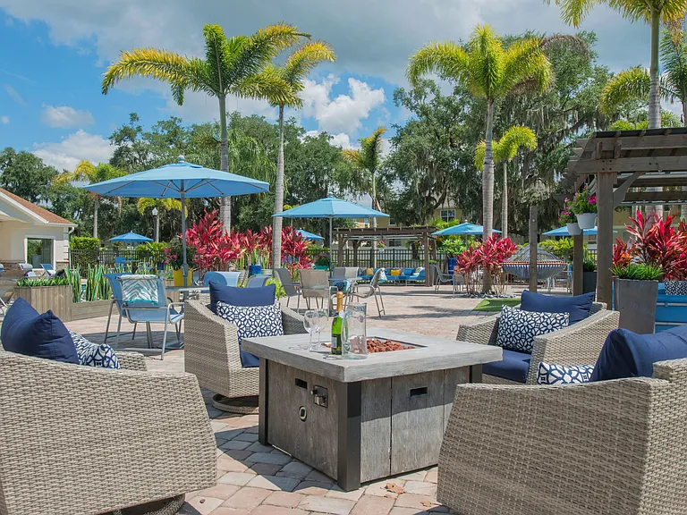 Experience the serene ambiance by enjoying a fire at our fire pit, offering captivating views of the lake.