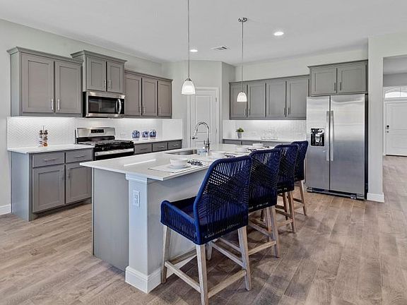 Kitchen-All Home and community information, including pricing, included features, terms, availability and amenities, are subject to change at any time without notice or obligation. All Drawings, pictures, photographs, video, square footages, floor plans, elevations, features, colors and sizes are approximate for illustration purposes only and will vary from the homes as built.