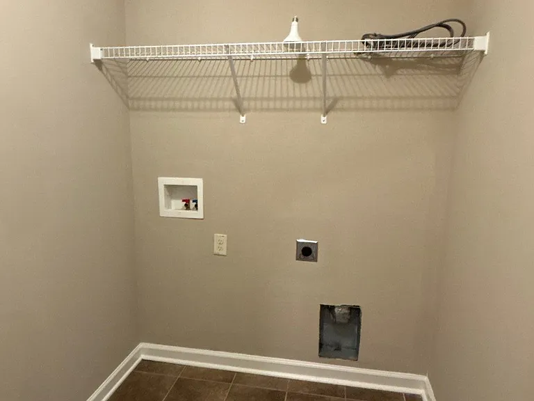 Upstairs Ceramic Tiled Laundry Room