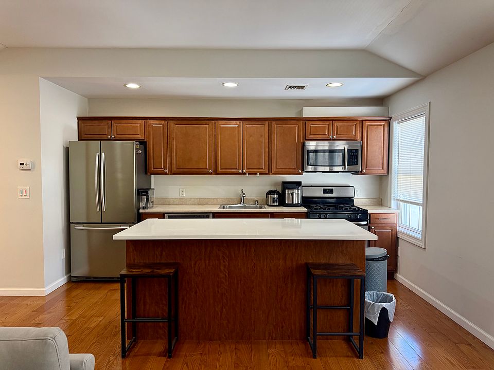 Open kitchen, new appliances, quartz countertops, stainless steal appliances