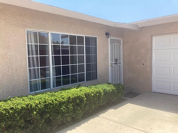parking in driveway, garage and on block wall fencing for tenants up to 4 cars...