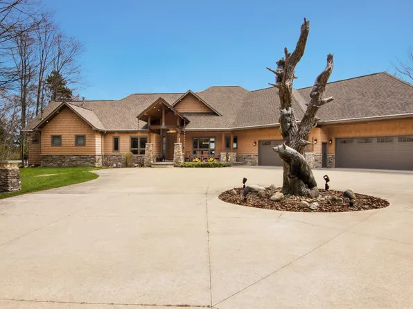 1165 N West Torch Lake Dr, Kewadin, MI 49648