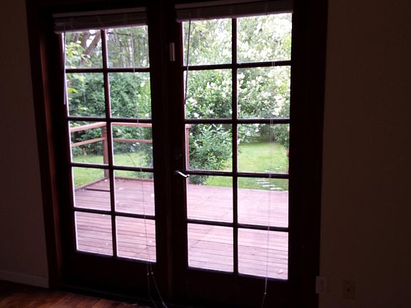 French doors to backyard and deck