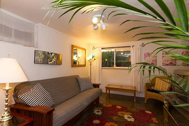 EXAMPLE OF LIVING ROOM FURNISHED. APARTMENT COMES UNFURNISHED. (PRIOR TO NEW PATIO DOOR)