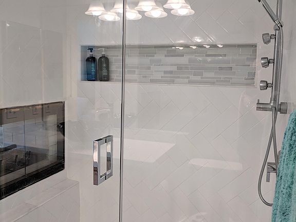 3rd story Master Bathroom with two way fireplace.