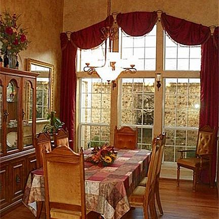 To your left, you will find the elegant formal dining with soaring ceiling and private fountain/courtyard view.